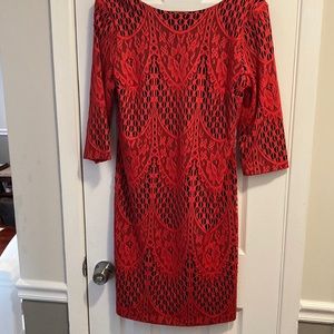 Lace overlay cocktail dress with deep blue black lining